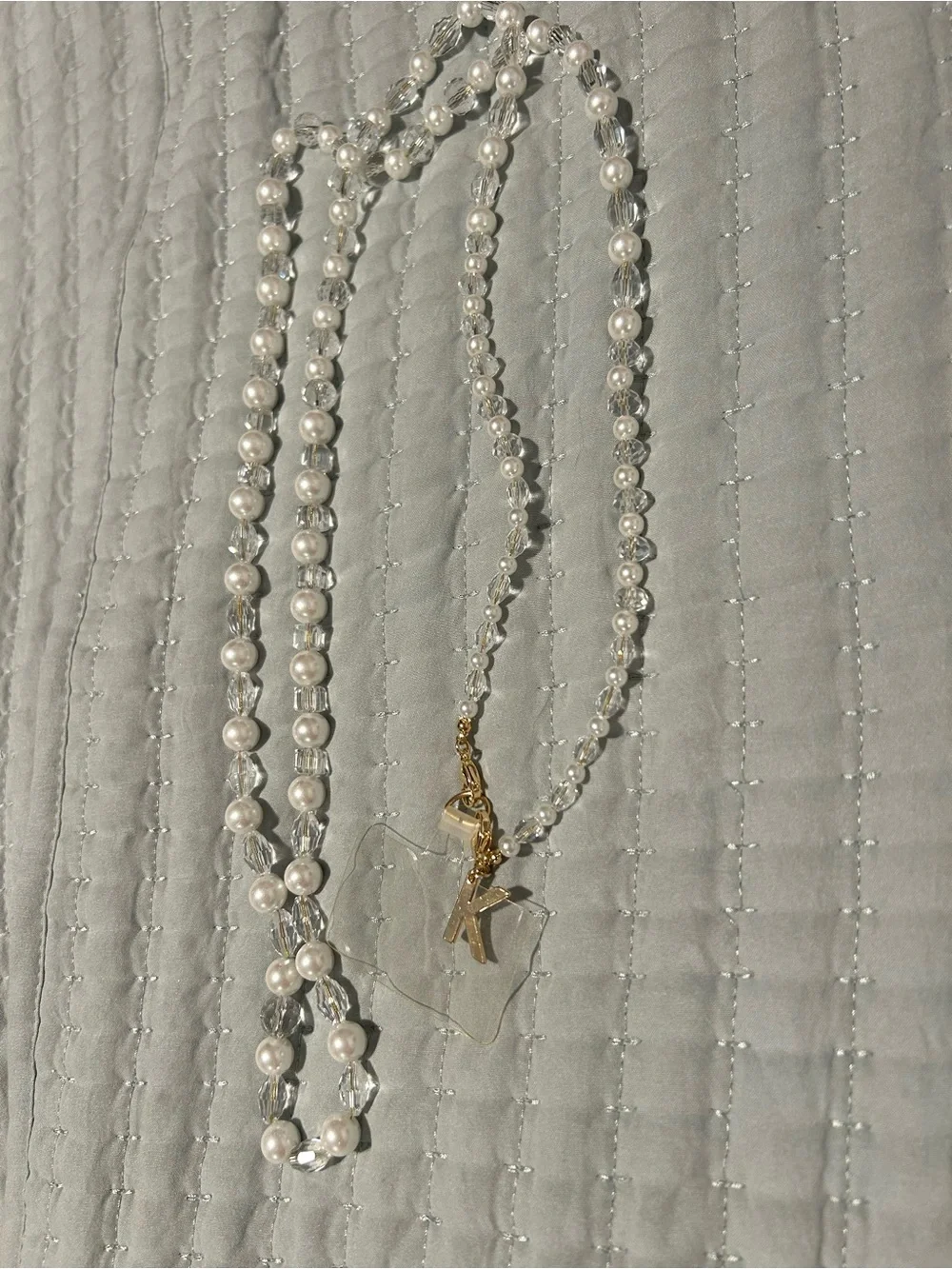 Phone chain with the letter K